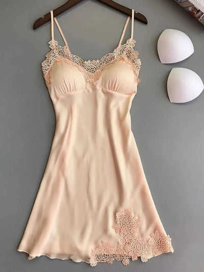 Champagne satin mini nightgown with V-neck lace trim and rose hem appliqués on hanger