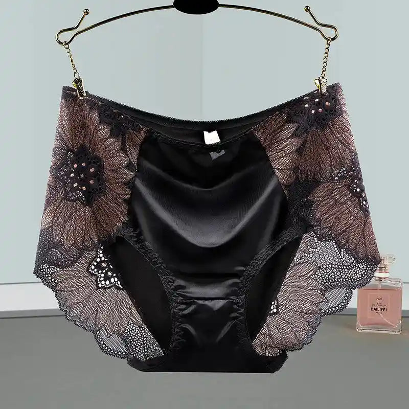 Black mid-rise satin panties with sheer floral lace side panels displayed on a hanger