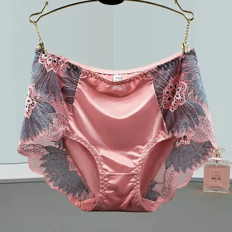 Pink satin panties with gray and pink floral lace side panels hanging on a gold clip hanger