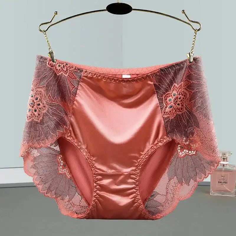 Coral satin mid-rise panties with wide floral lace side panels and scalloped trim on a hanger