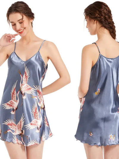 Front and back side-by-side view of a steel blue crane print satin nightgown with floral back detail