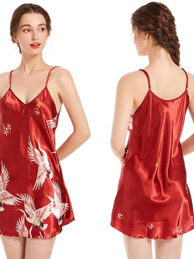 Front and back views of red satin crane print nightgown with adjustable spaghetti straps