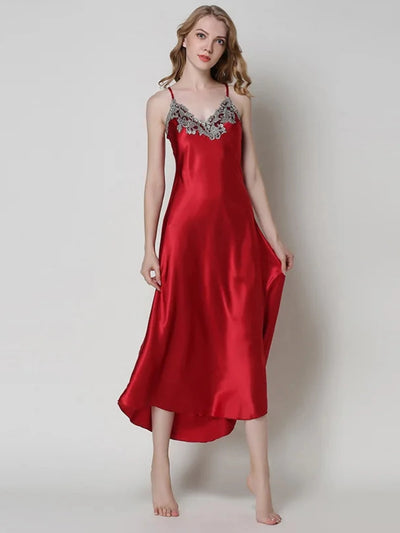 Full-length view of a red satin nightgown with lace applique neckline and asymmetrical hem