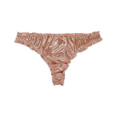Product shot of dusty rose satin thong panties with ruffled trim and center bow on white background