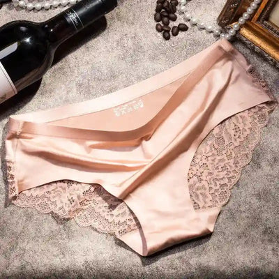 Blush pink satin panty with wide scalloped lace hip panels on Paris-print background