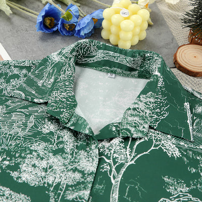 Detail of green toile shirt dress collar and care label tag on flat lay