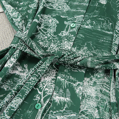 Detail of shirt dress waist tie and front pocket with green button