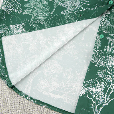 Inside view of shirt dress showing mint-toned toile lining and green button placket